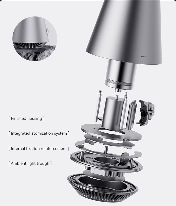 Exploded ScentStudio construction view showing the atomisation assembly and all-metal body